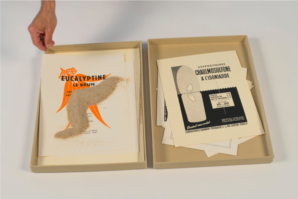 Screen-printed box from 2020 by the Portuguese artist Francisco Tropa containing sand and screen-printed reproductions of advertisements from an old scientific journal entitled The Lung and the Heart