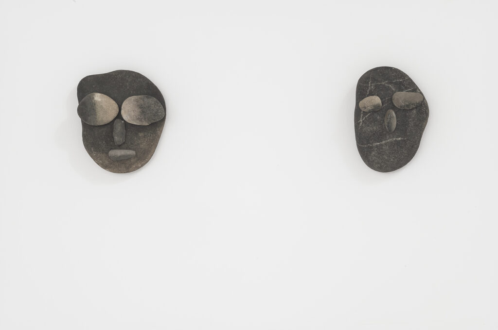 Prinz Gholam, Pair, 2021, stones and glue, 2 elements, overall : ca 13 x 53 cm, unique Glued stone sculptures of faces by artist duo Prinz Gholam